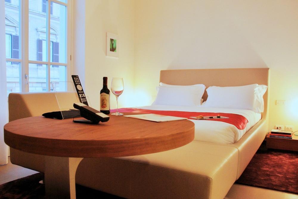 Palazzo Montemartini Rome, A Radisson Collection Hotel Luaran gambar A typical studio apartment