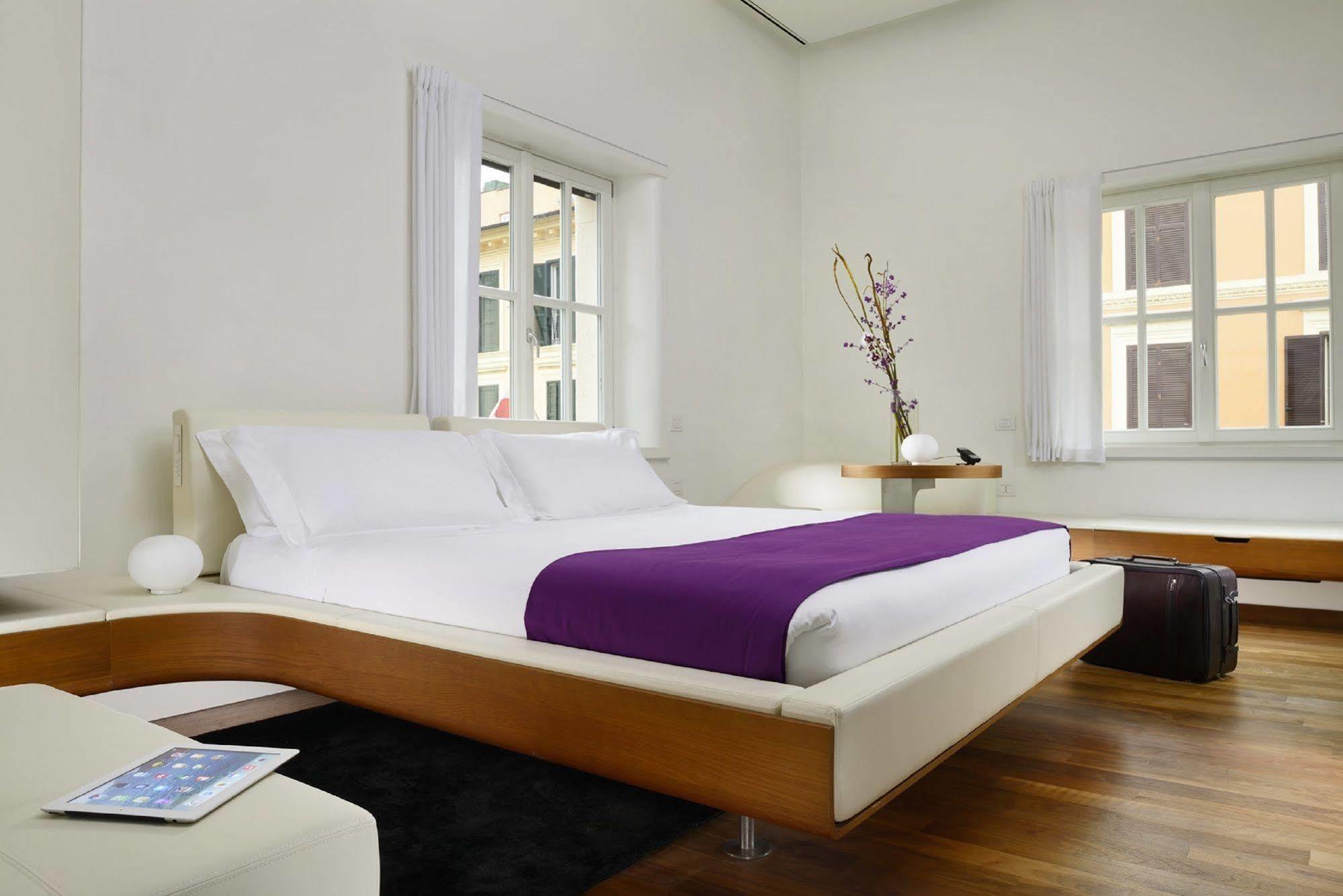 Palazzo Montemartini Rome, A Radisson Collection Hotel Luaran gambar A bedroom at the Standard East Village