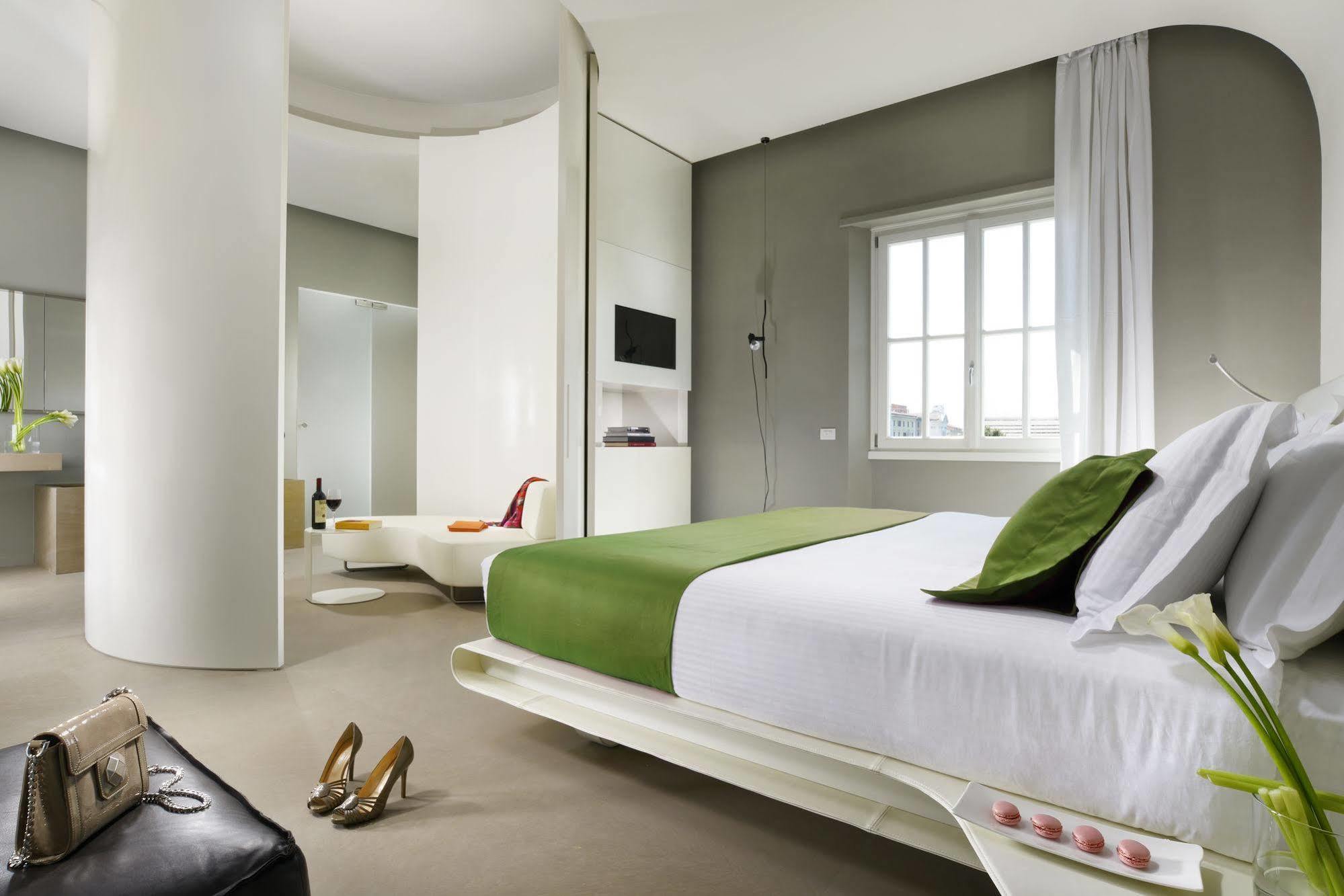 Palazzo Montemartini Rome, A Radisson Collection Hotel Luaran gambar A bedroom at the hotel